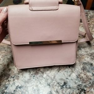 Light pink crossbows. Beautiful condition.